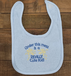Under this mess is a REALLY Cute Kid Bib (light Blue)